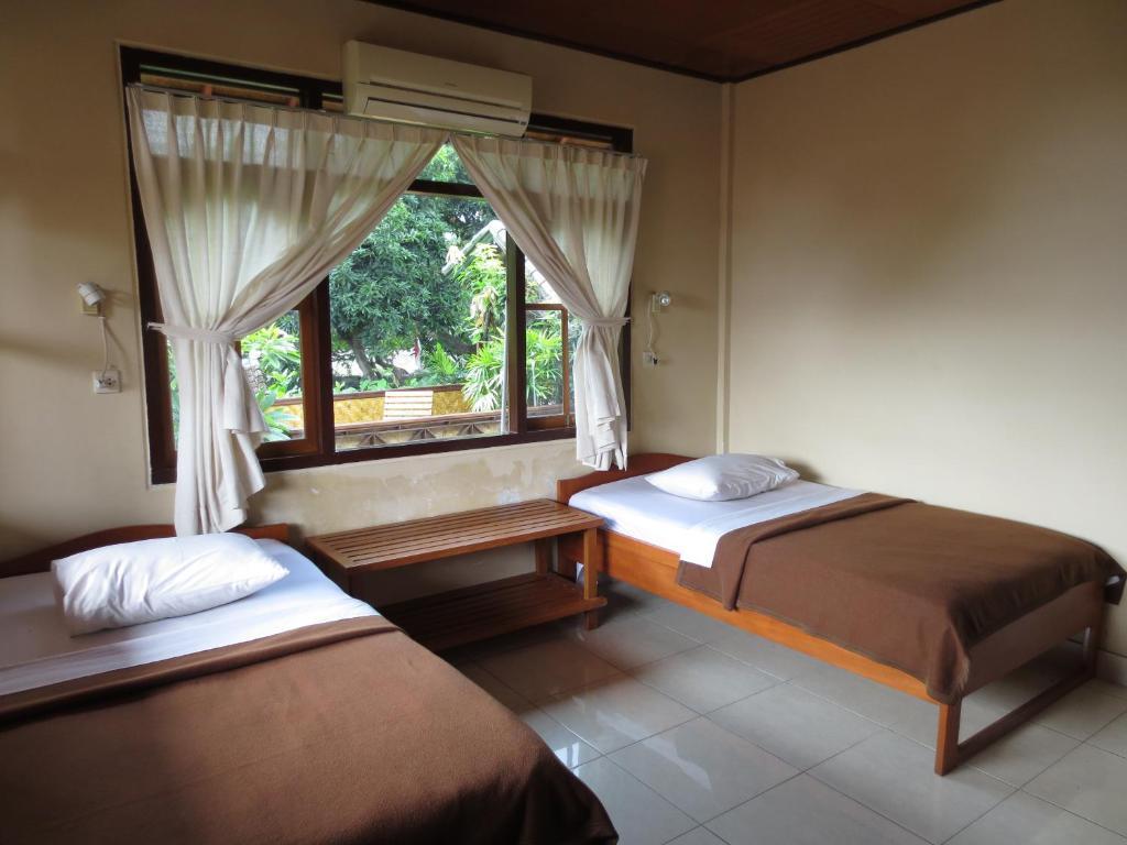 Paradise Palm Beach Bungalows And Dive Center Tulamben Rom bilde