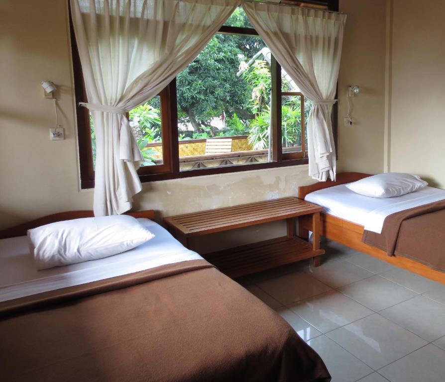 Paradise Palm Beach Bungalows And Dive Center Tulamben Rom bilde